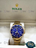 SUBMARINER gold , blue dial, oyster bracelet