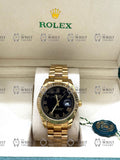 DATE JUST gold , black dial , president bracelet
